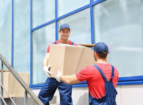 Removal team helping with a local house move in Enfieldwash