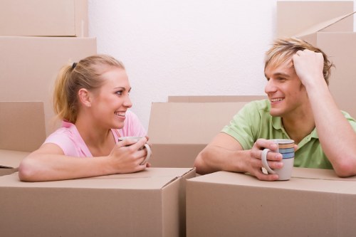 Residential movers loading furniture and boxes for a local move