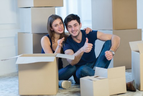 Loading furniture into a moving van in Enfieldwash