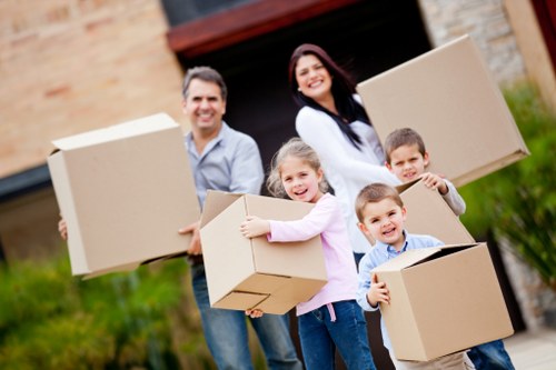 Loading household furniture into a removal truck