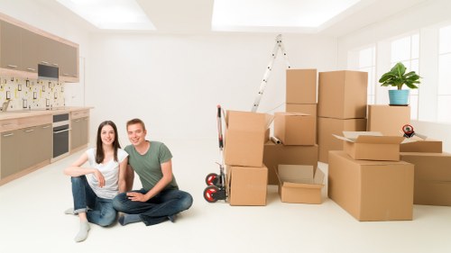 Commercial moving team handling office equipment in Enfieldwash