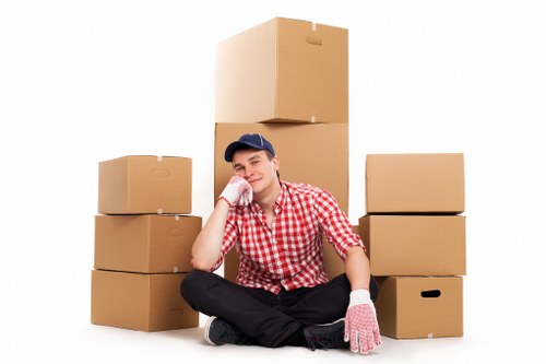 Moving team handling furniture with care during transport